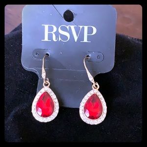 Pear shaped ruby; encrusted with accent diamonds